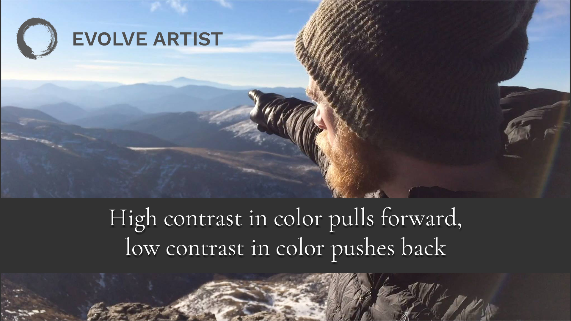 Folta and mountains; high contrast pulls forward, low contrast pushes back Mountains and person in high contrast pull forward and mountains with low contrast push back in photo